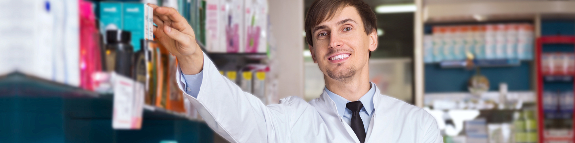 male doctor looking at camera while smiling